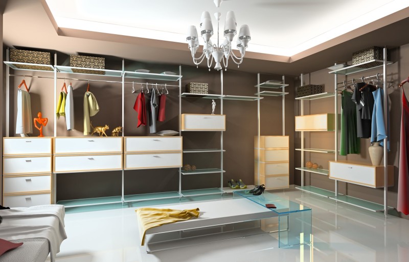 A very modern interior view of a contemporary and expansive woman's walk in wardrobe A very modern interior view of a contemporary and expansive woman's walk in wardrobe